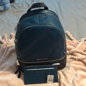 Michael Kors Rhea ZIP back pack &  card case .
